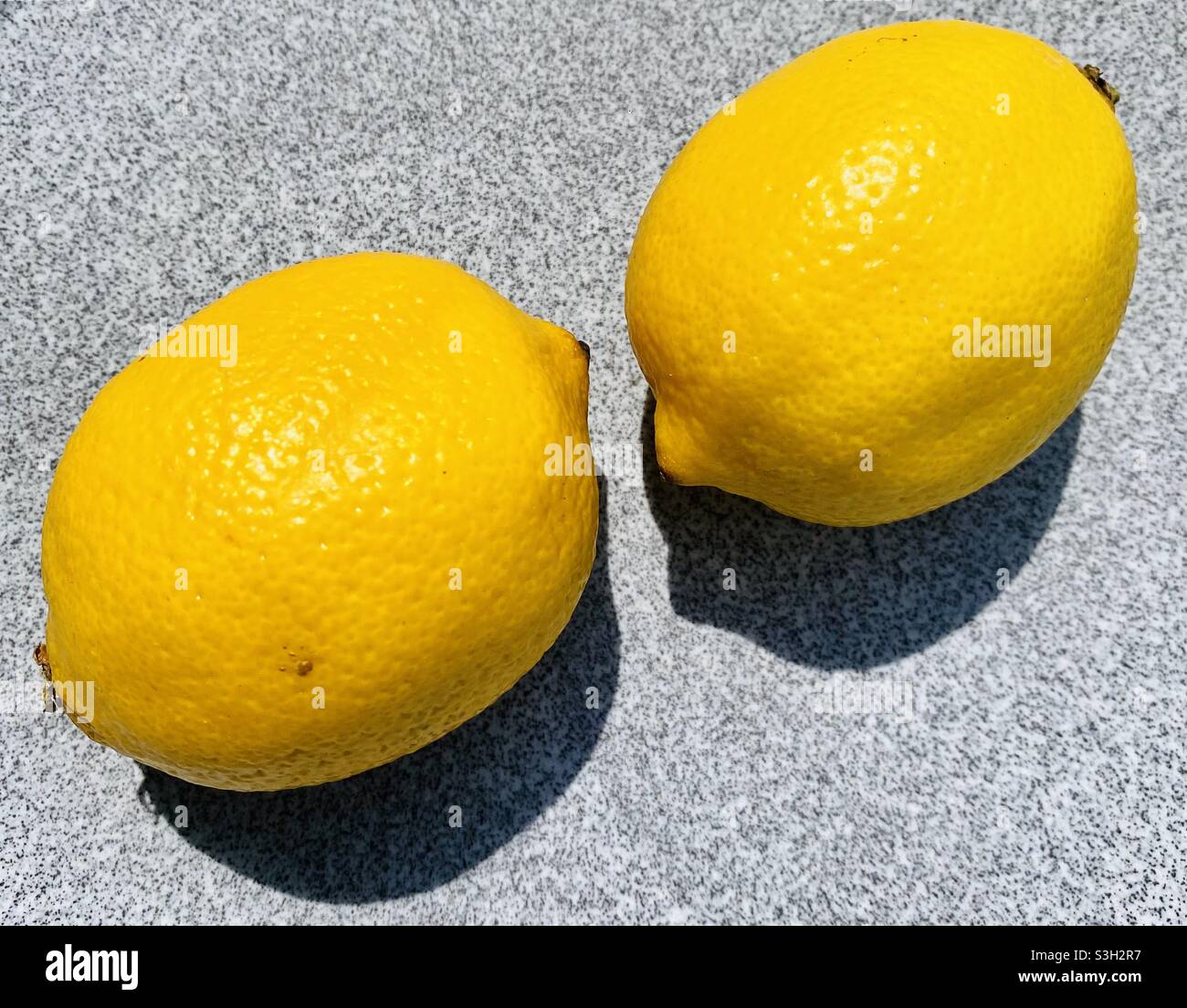 Lemons on a plate Stock Photo