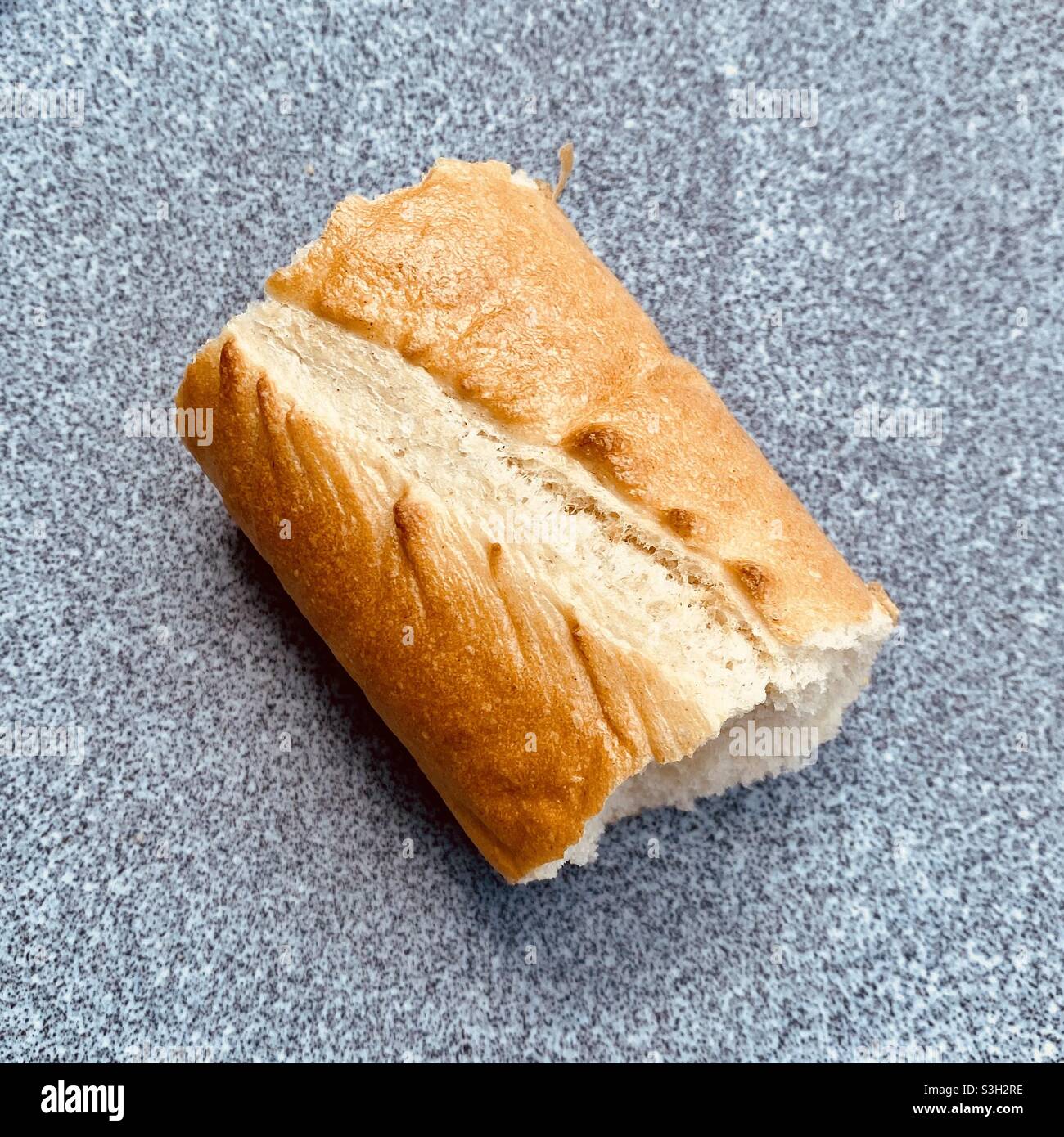 Piece of bread on a plate Stock Photo