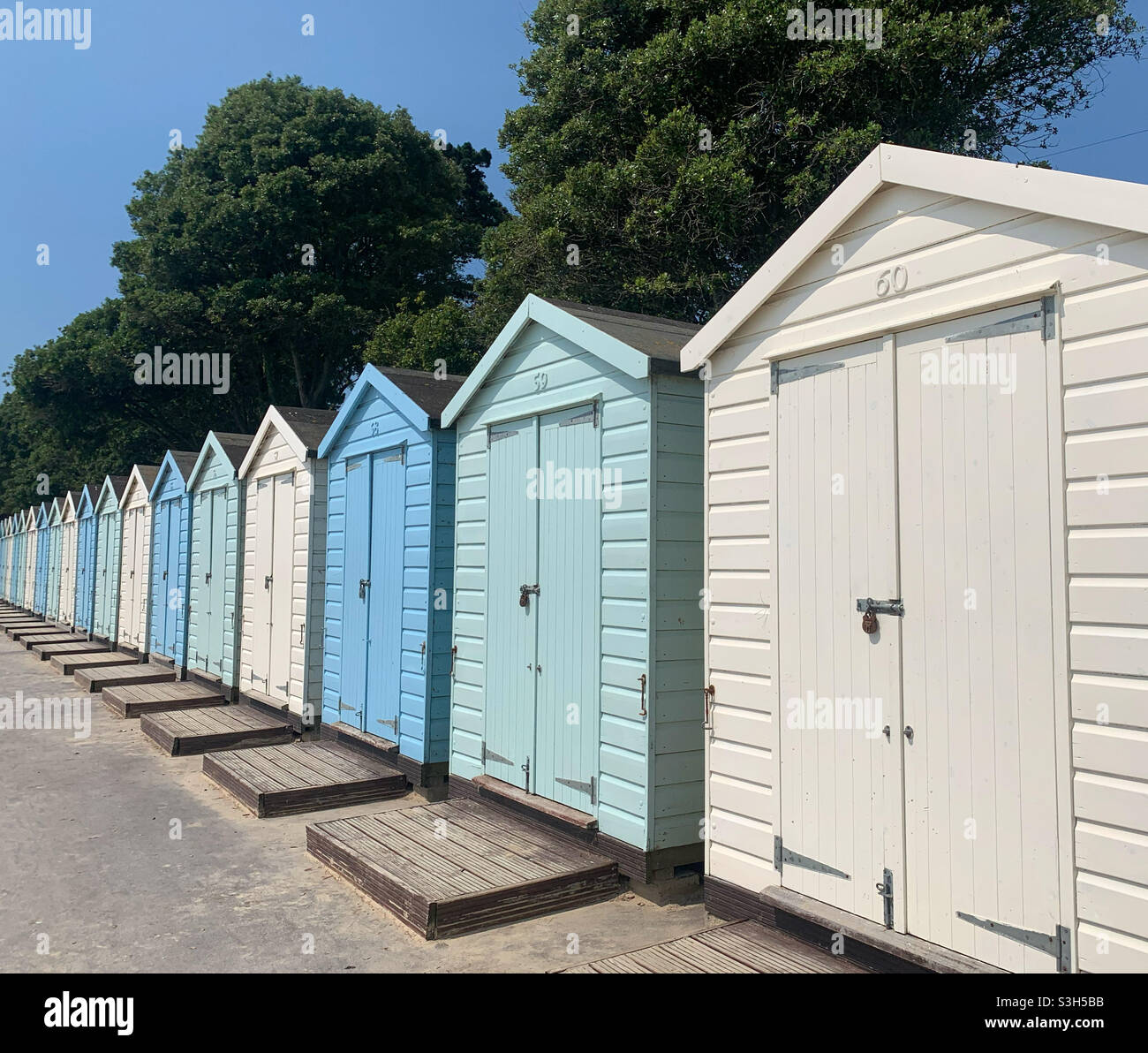 Beach huts at Avon Beach Stock Photo Alamy