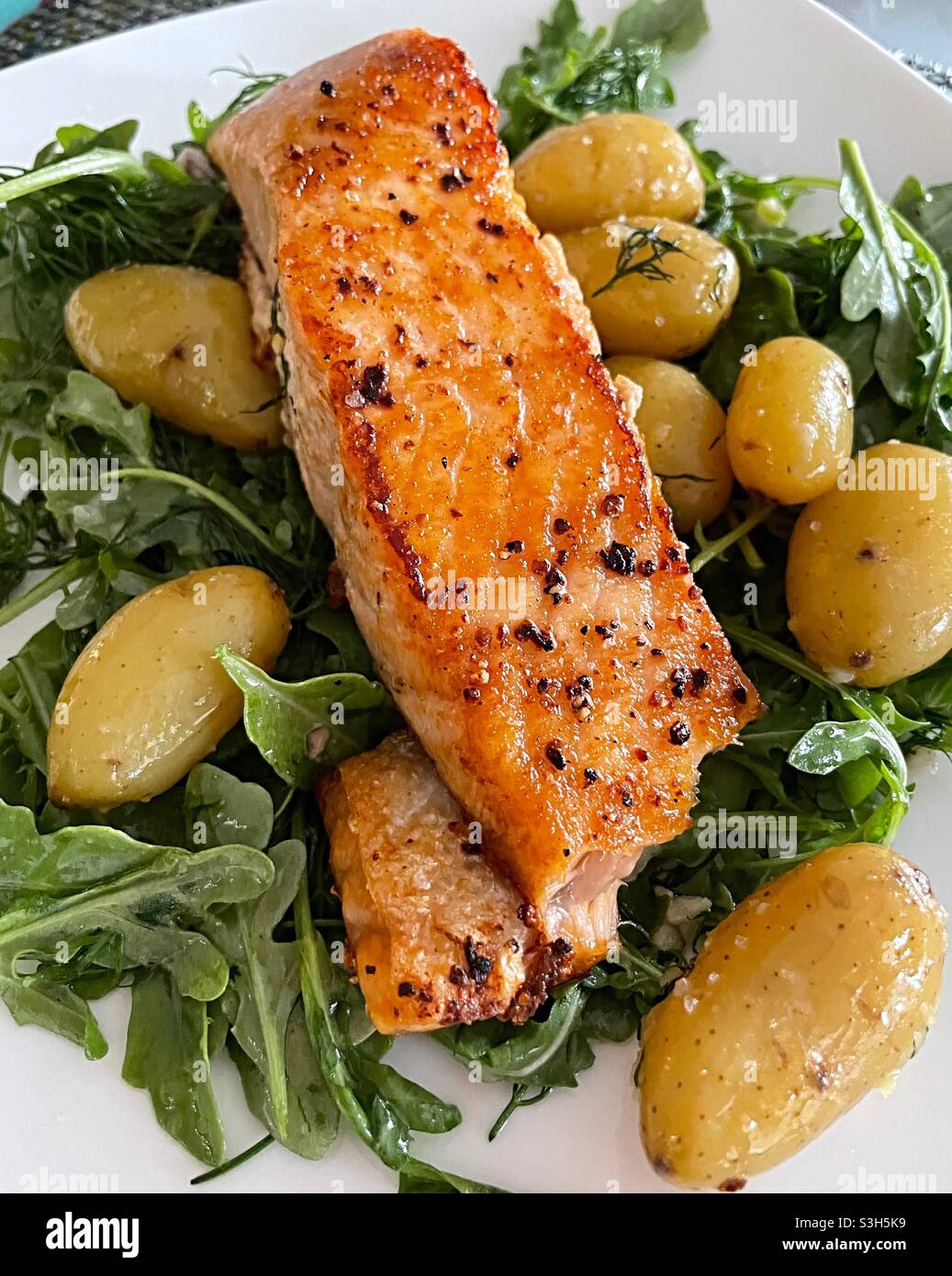 Close Up of Grilled Salmon and New Potato Entree,  USA - Smartphone Captured Stock Image