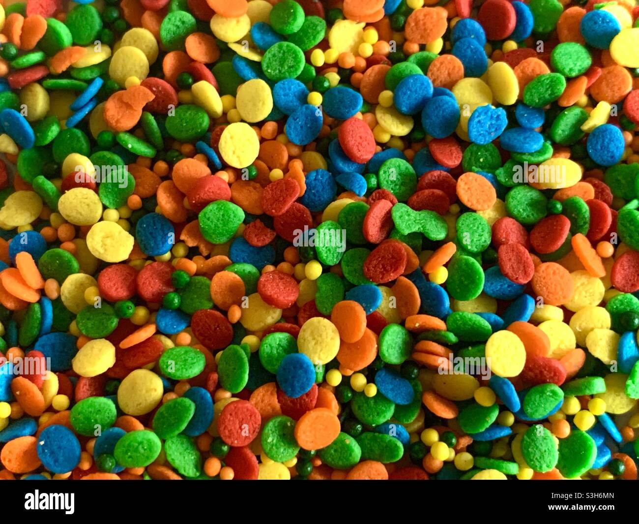 Candies - colorful candy Sprinkles - rainbow colored sprinkles up close Stock Photo