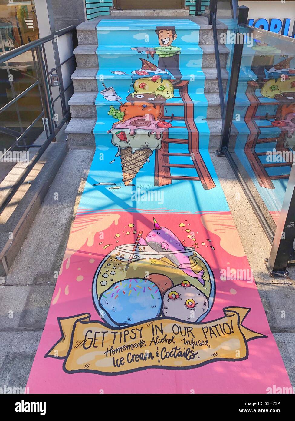 A colourful entrance to an ice cream shop in Yorkville, a Toronto downtown neighbourhood. - Smartphone Captured Stock Image