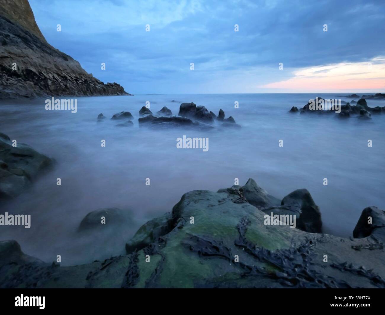 Seascape at dusk, Mewslade, Gower, South Wales, August. - Smartphone Captured Stock Image