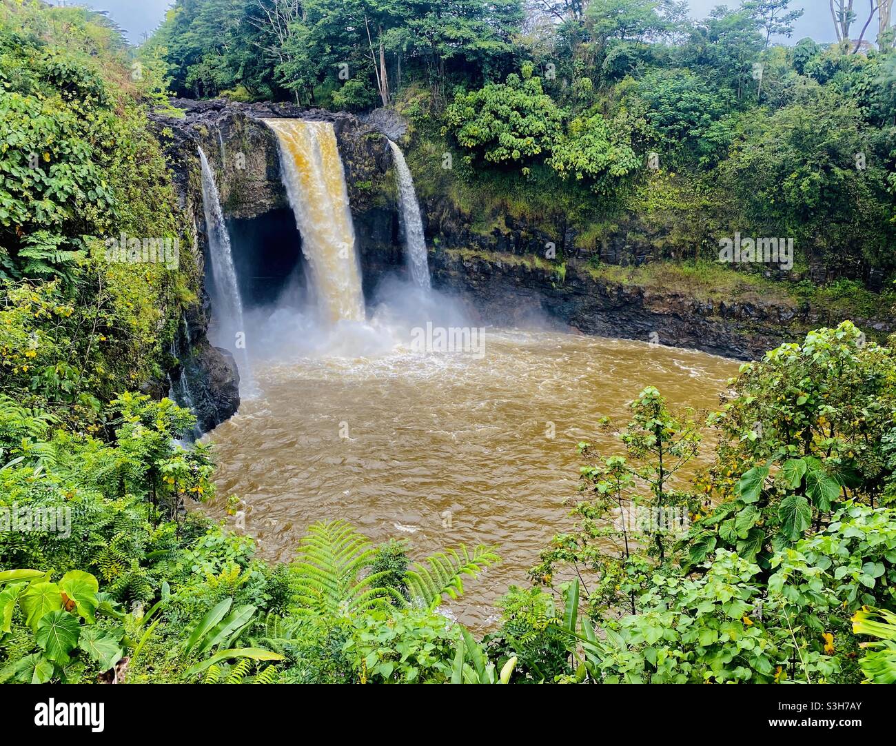 Silty Rainbow Falls in Hilo, Hawaii, after rains - Smartphone Captured Stock Image