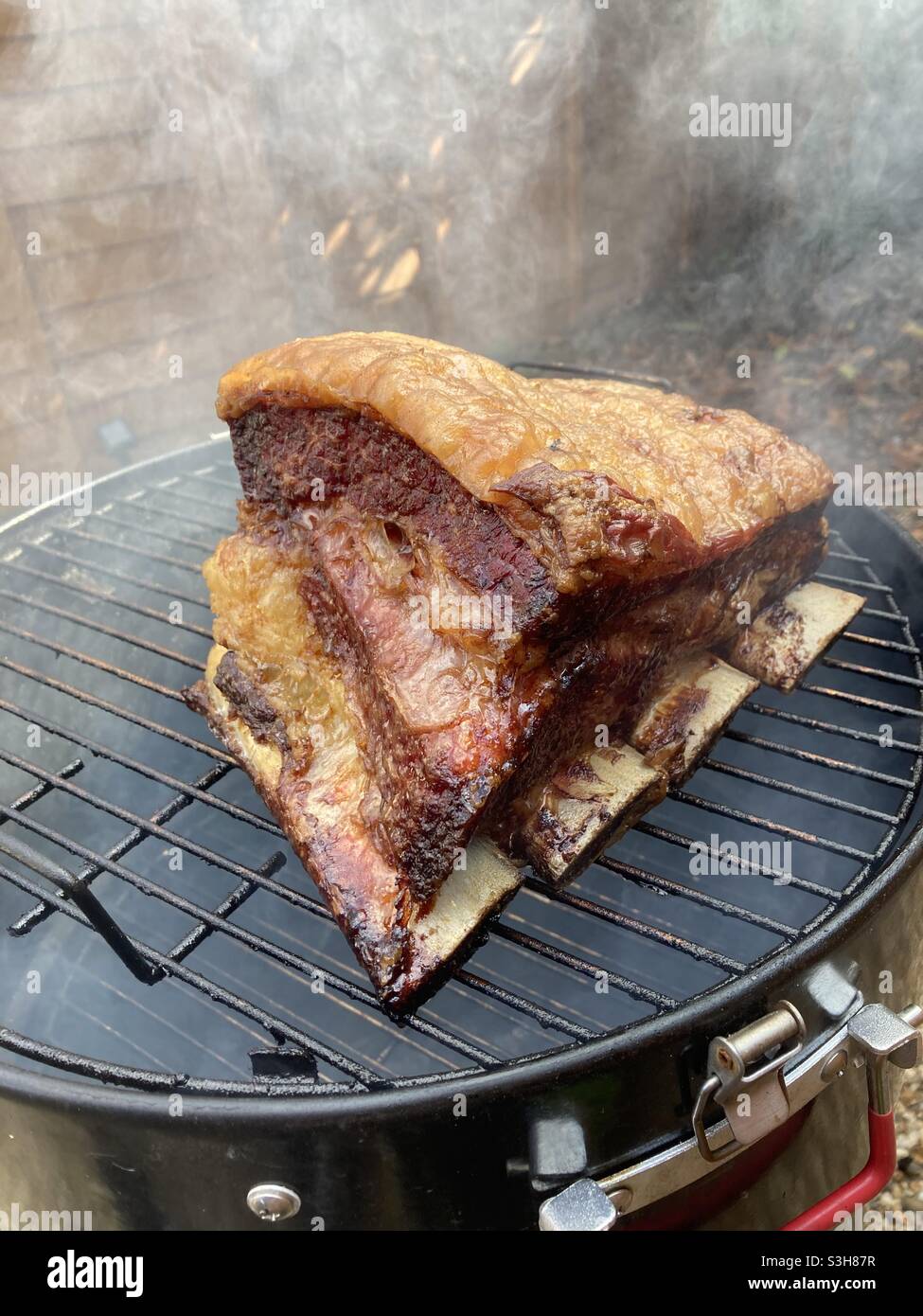 Beef Ribs Cooked on a smoker. Stock Photo