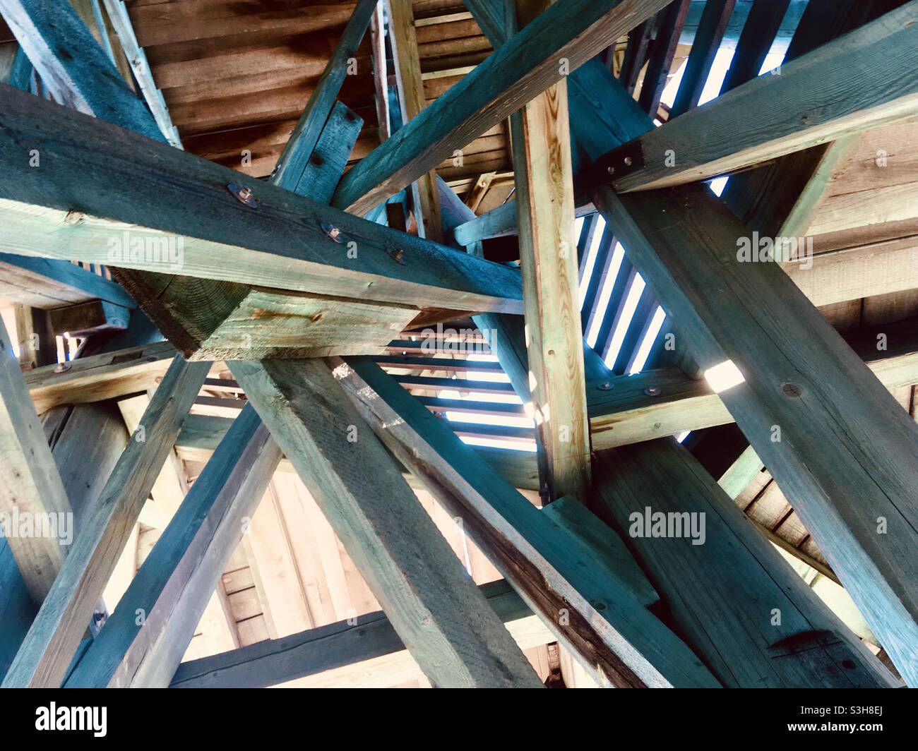 Wooden structure of Hubertus lookout tower viewed from below, Sopron, Hungary Stock Photo