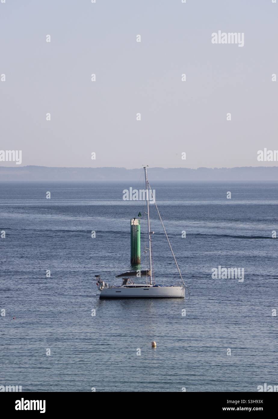 Summer vacation on a sailboat in Brittany, Quiberon, France and a foggy sky - Smartphone Captured Stock Image
