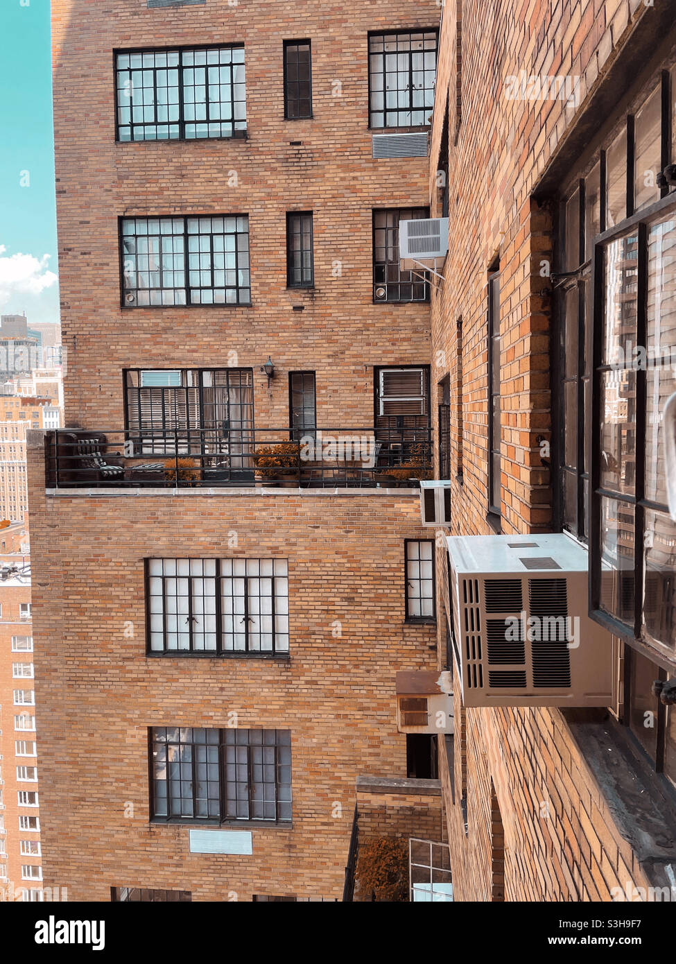 Window Air Conditioners active in a hot summer of 2021, NYC, USA - Smartphone Captured Stock Image