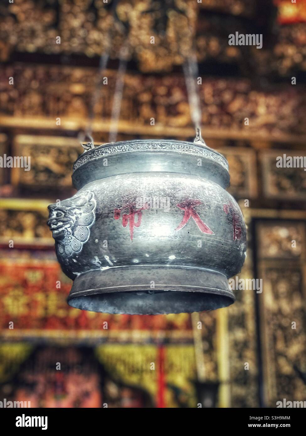 Hanging incense burner at the Leong San Tong Khoo Kongsi clanhouse in George Town, Penang, Malaysia - Smartphone Captured Stock Image