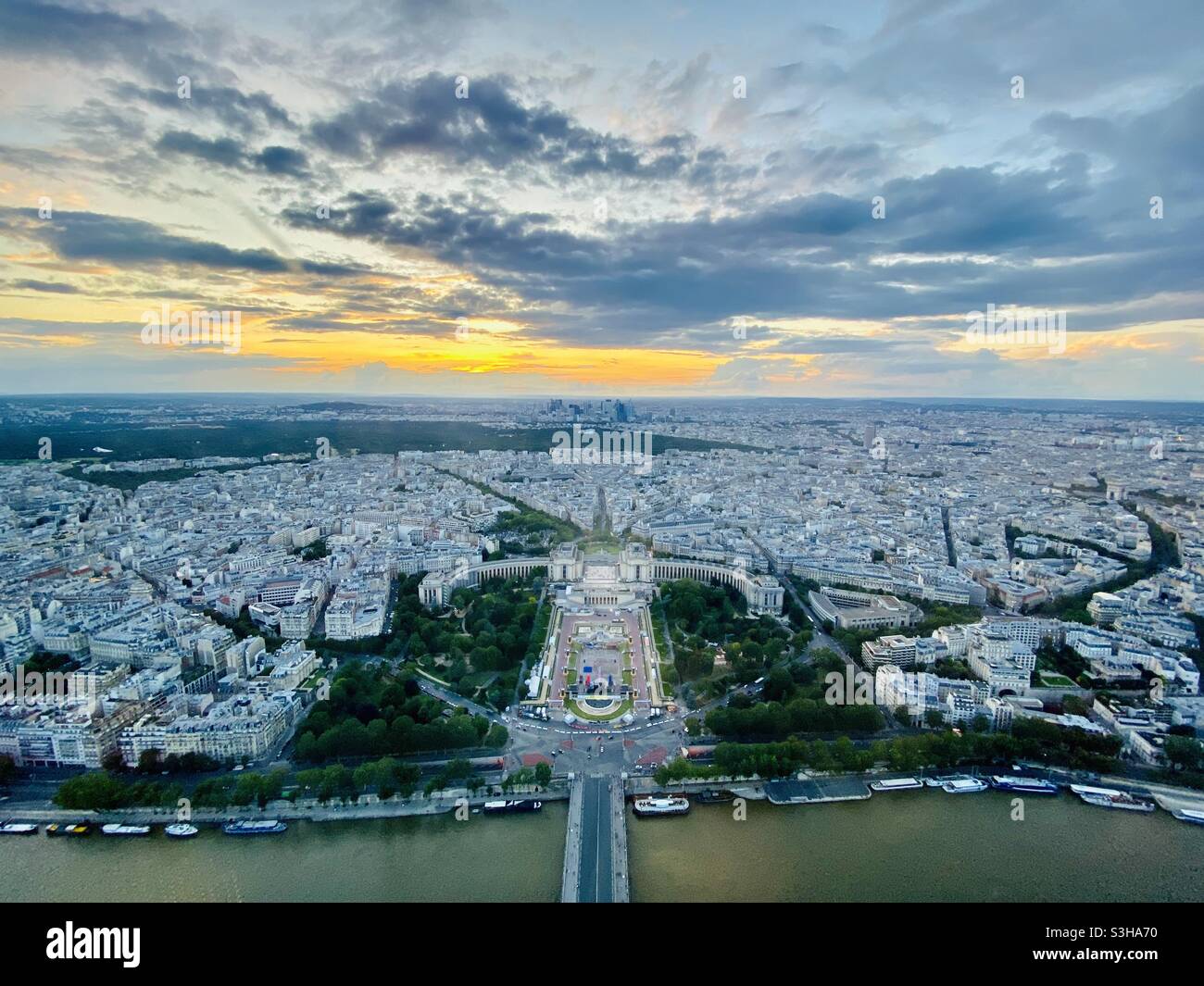 Paris city skyline at sunset from the Eiffel Tower, with the river Siene, the plaza of the Trocadero in the foreground - Smartphone Captured Stock Image