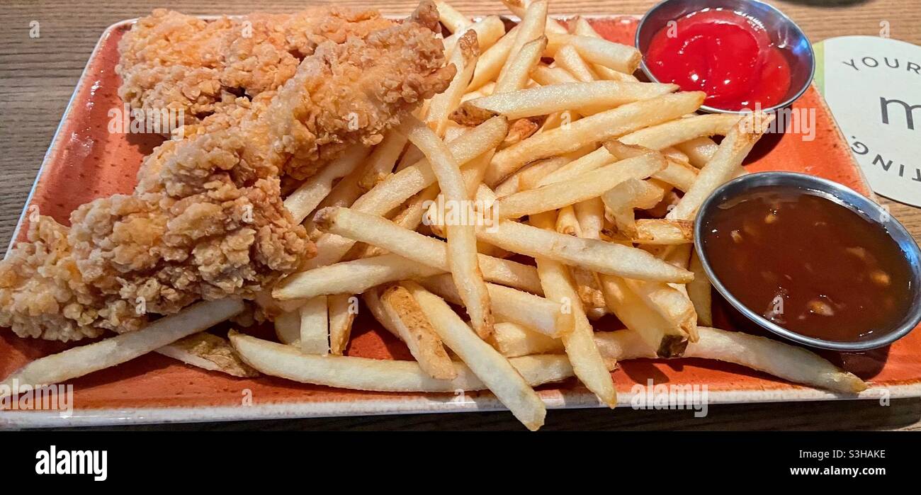 Chicken tenders and fries Stock Photo Alamy