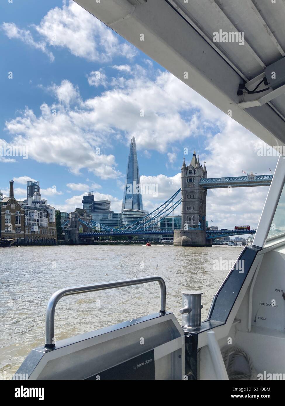 View of the Shard and Tower Bridge from the Thames Clipper, London - Smartphone Captured Stock Image
