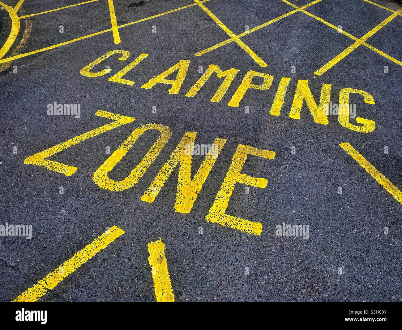 CLAMPING ZONE. Be careful where you park! Don’t annoy anybody. You have been warned! Photo Credit - ©️ COLIN HOSKINS. - Smartphone Captured Stock Image