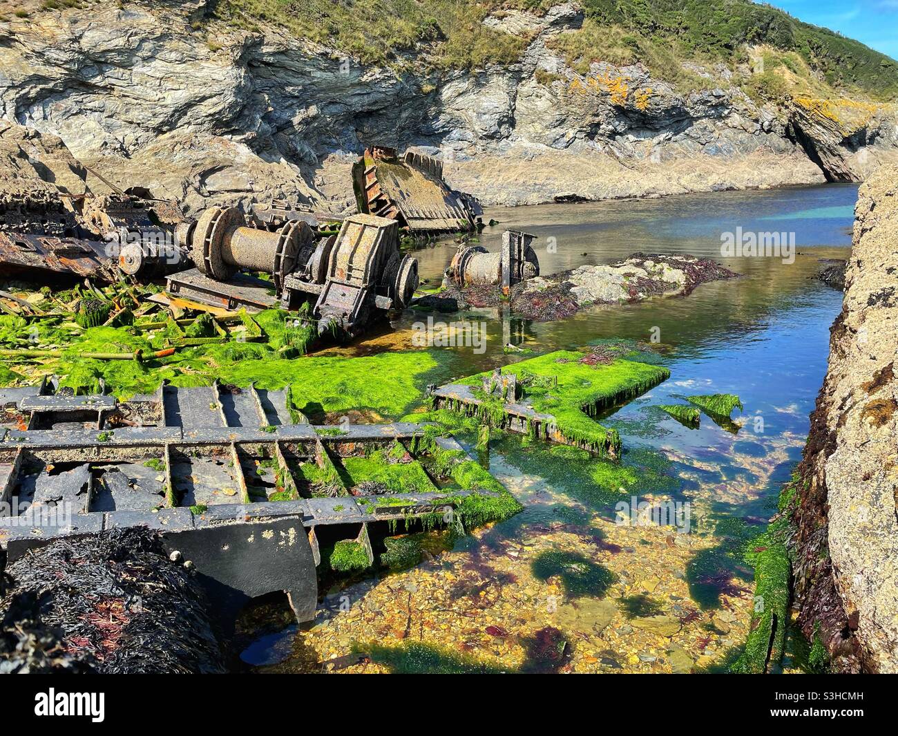 The wreck of the Ben Asdale, a Scottish fishing trawler that ran aground off Maenporth beach near Falmouth during a blizzard in December 1978. - Smartphone Captured Stock Image