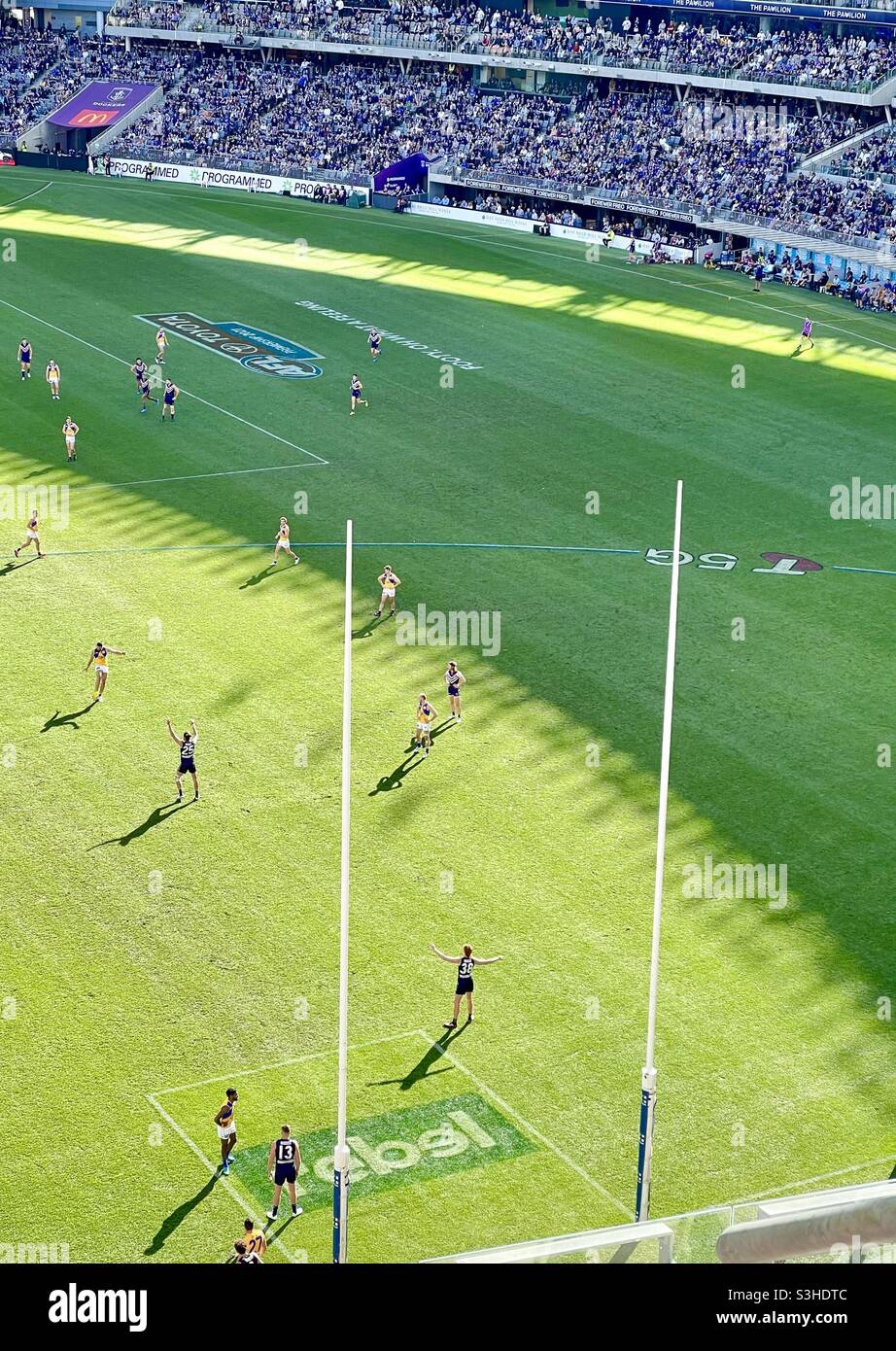 Josh Kennedy kicking for goal Western Derby AFL football game between