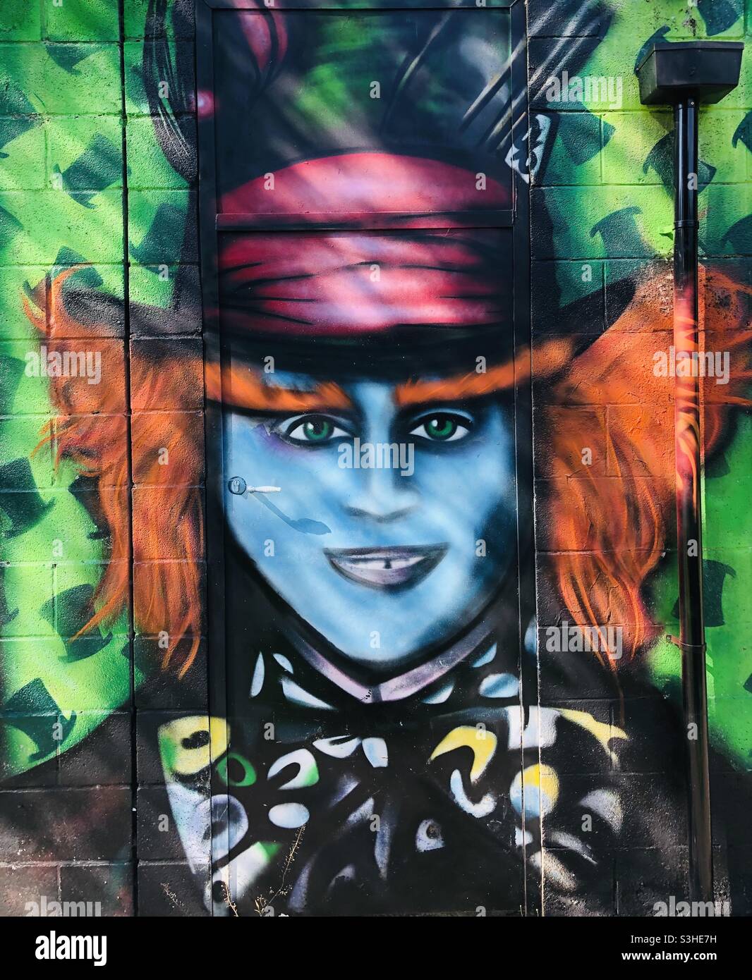 Wall art graffiti Mad Hatter Johnny Depp from Alice in Wonderland film Stock Photo