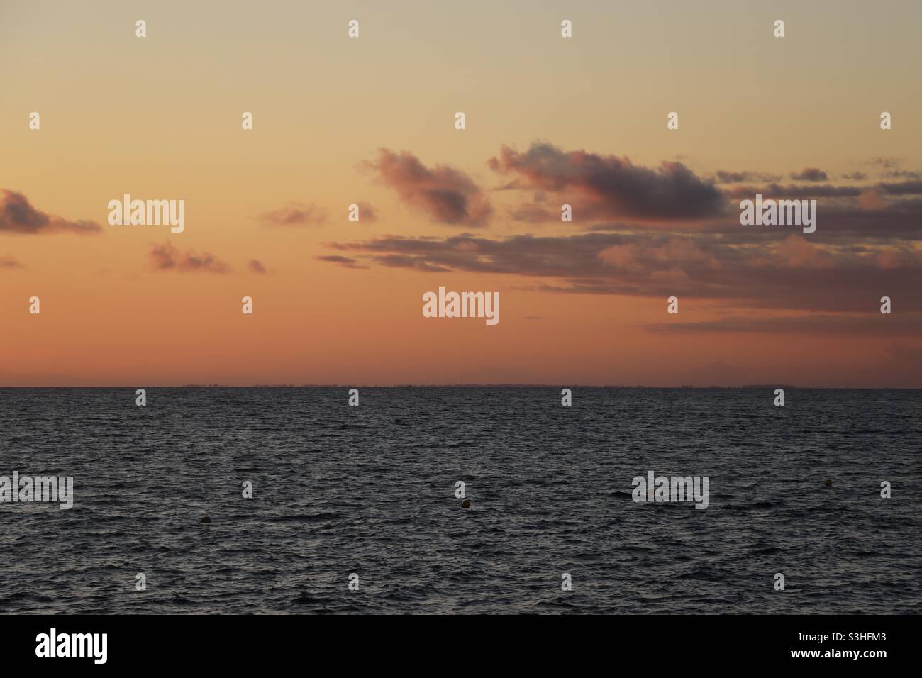 Sunset and orange sky at Le Croisic in Loire Atlantique, a french department - Smartphone Captured Stock Image