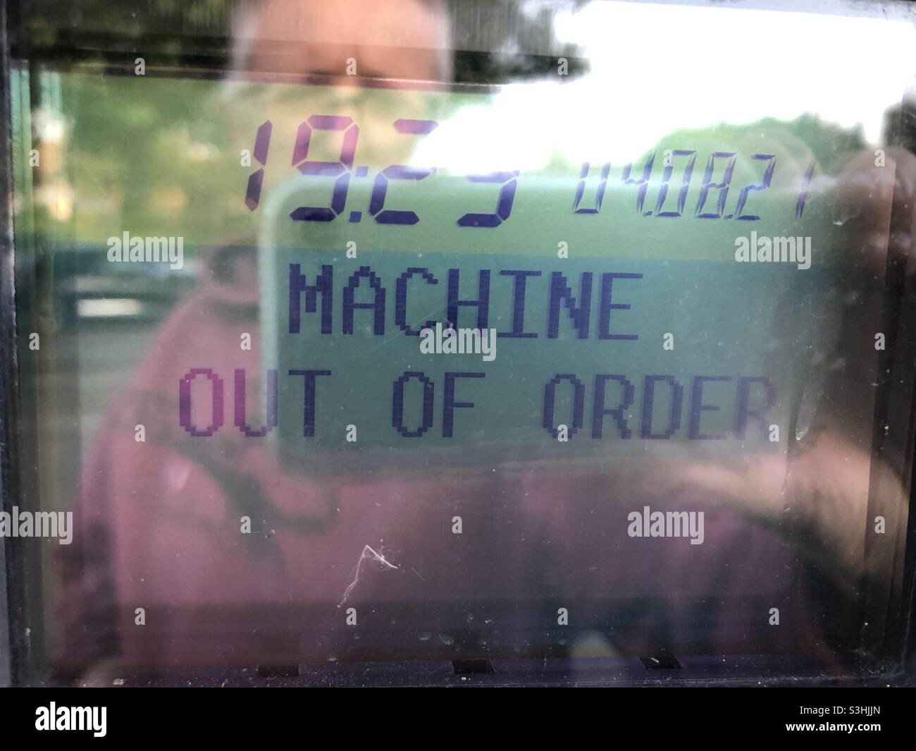 Machine out of order with self-portrait Stock Photo