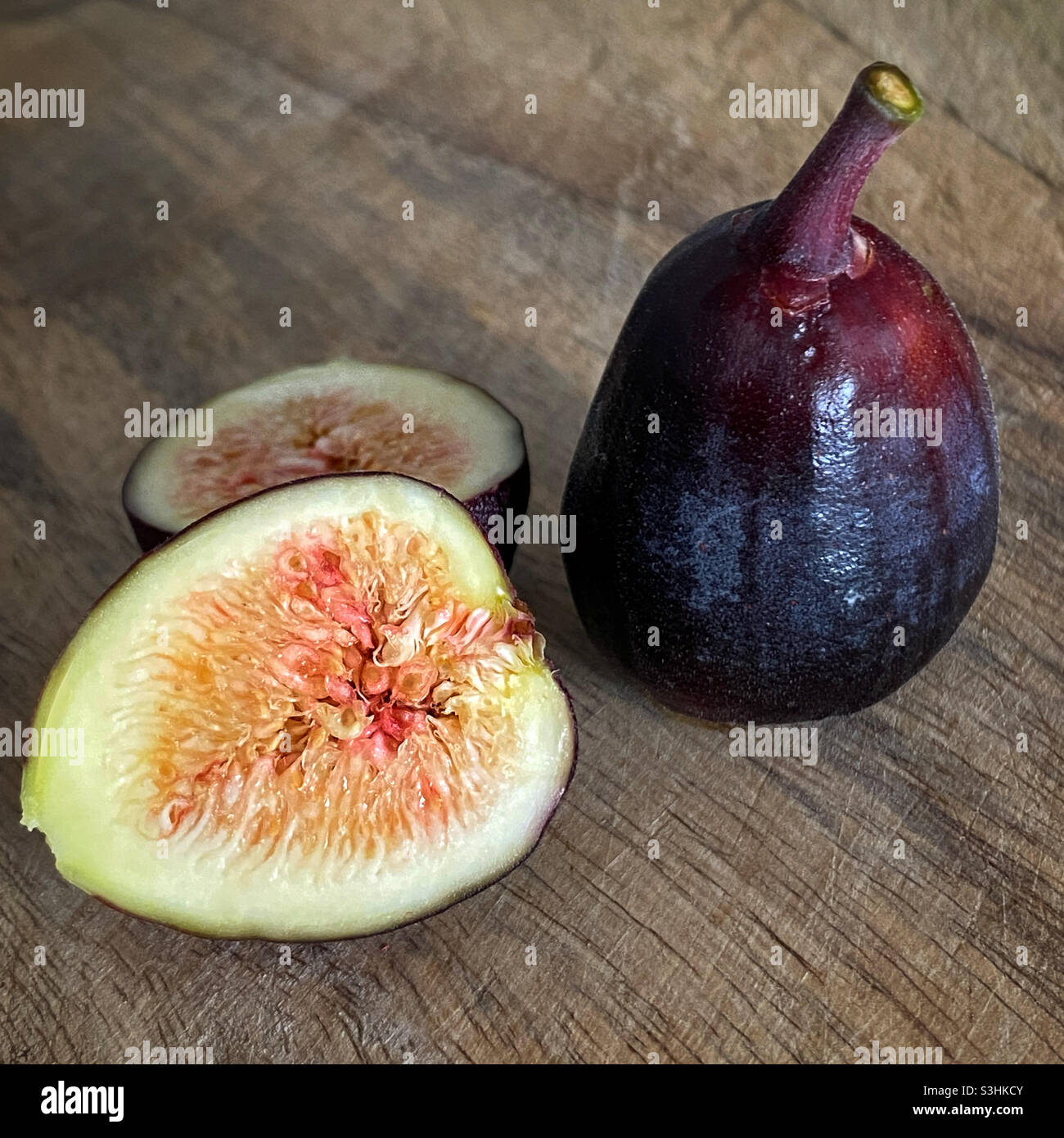 Figs on a wooden cutting board Stock Photo