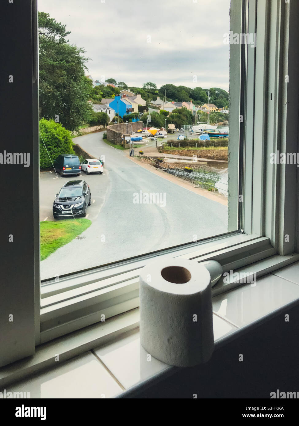 View from a bathroom window in a hotel in Milford Haven in Pembrokeshire, Wales, UK - Smartphone Captured Stock Image