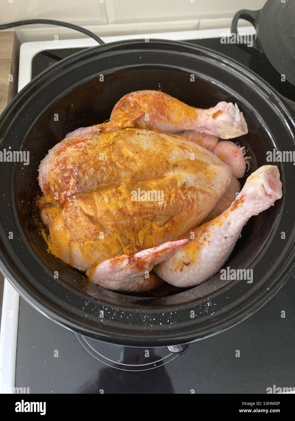 Slow cooker roast chicken Stock Photo Alamy