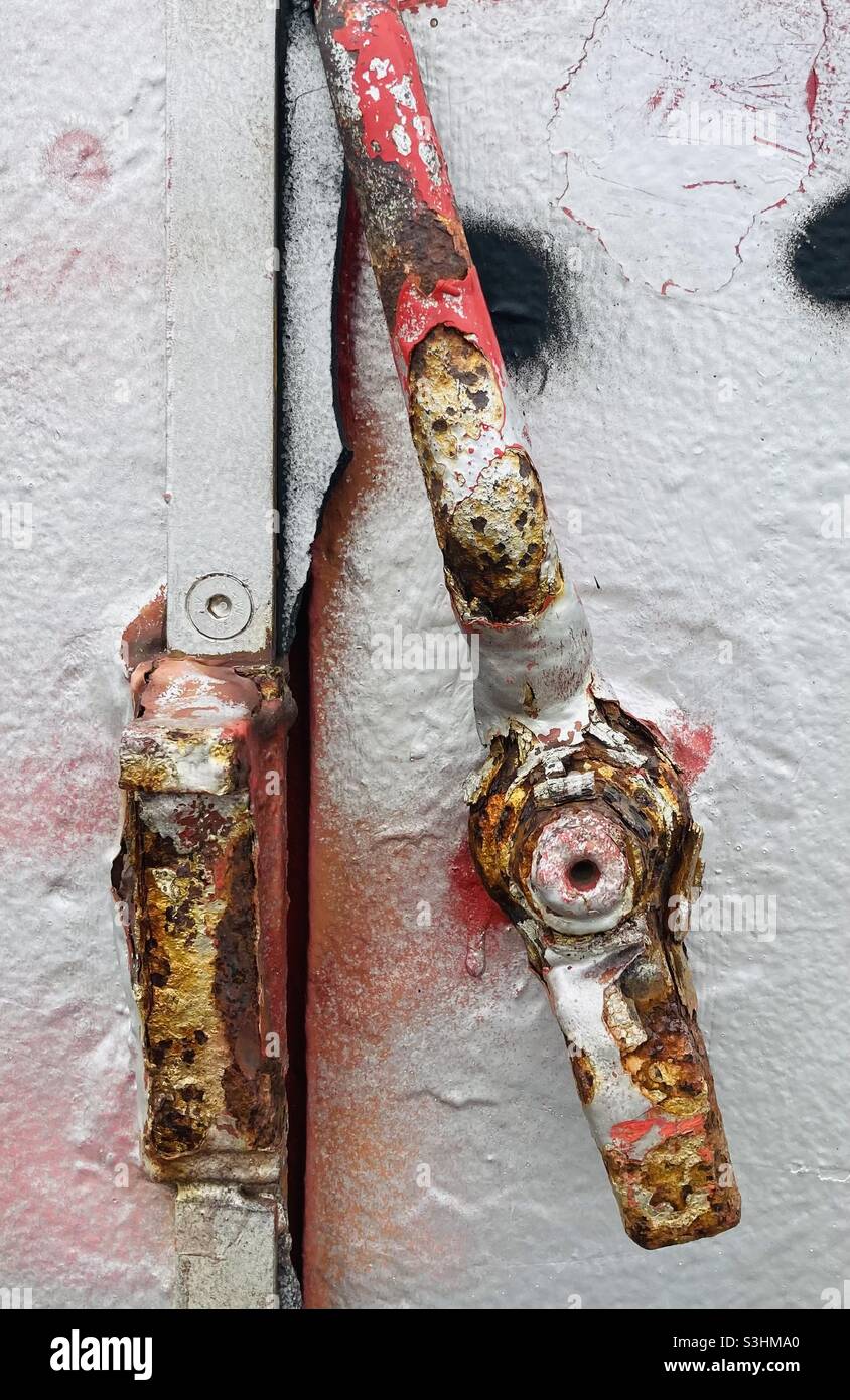 Rusty tension lever with peeling paint - Smartphone Captured Stock Image