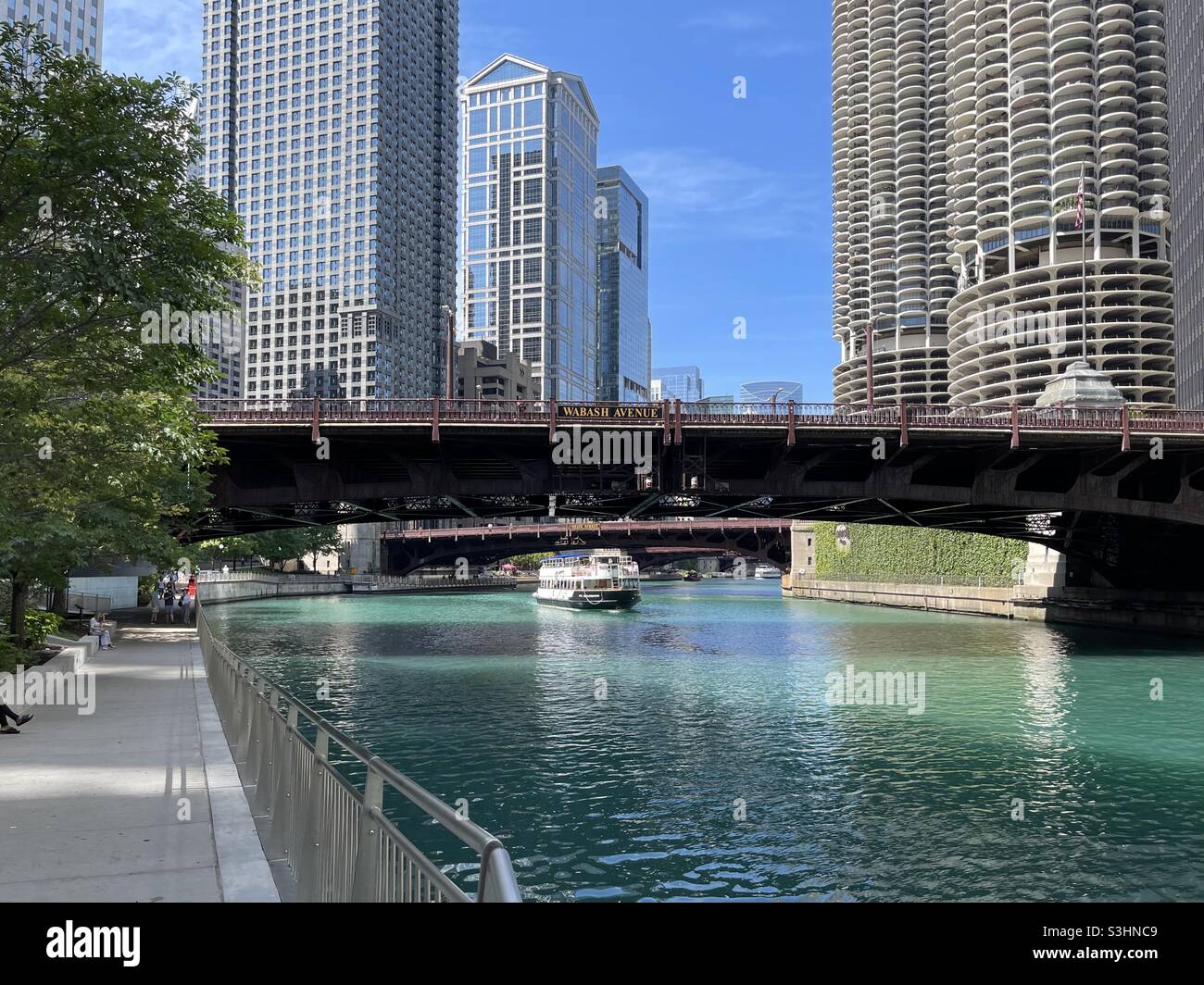 Excursion boat approaching Wabash Avenue Bridge on the Chicago River. Stock Photo