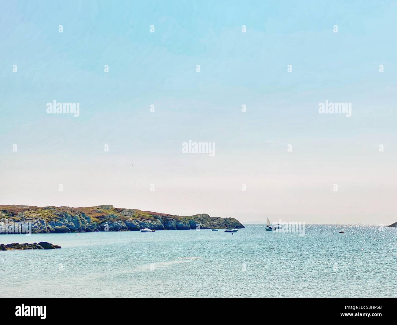Rhoscolyn beach and bay on a warm summer afternoon, Anglesey, UK, North Wales, Gwynedd, cymru, - Smartphone Captured Stock Image