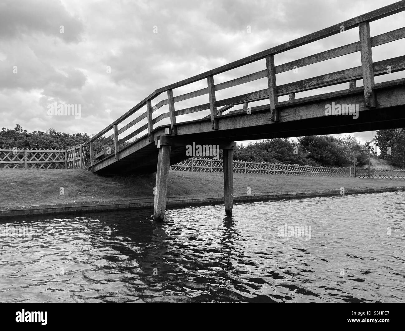 Wooden footbridge over River - Smartphone Captured Stock Image
