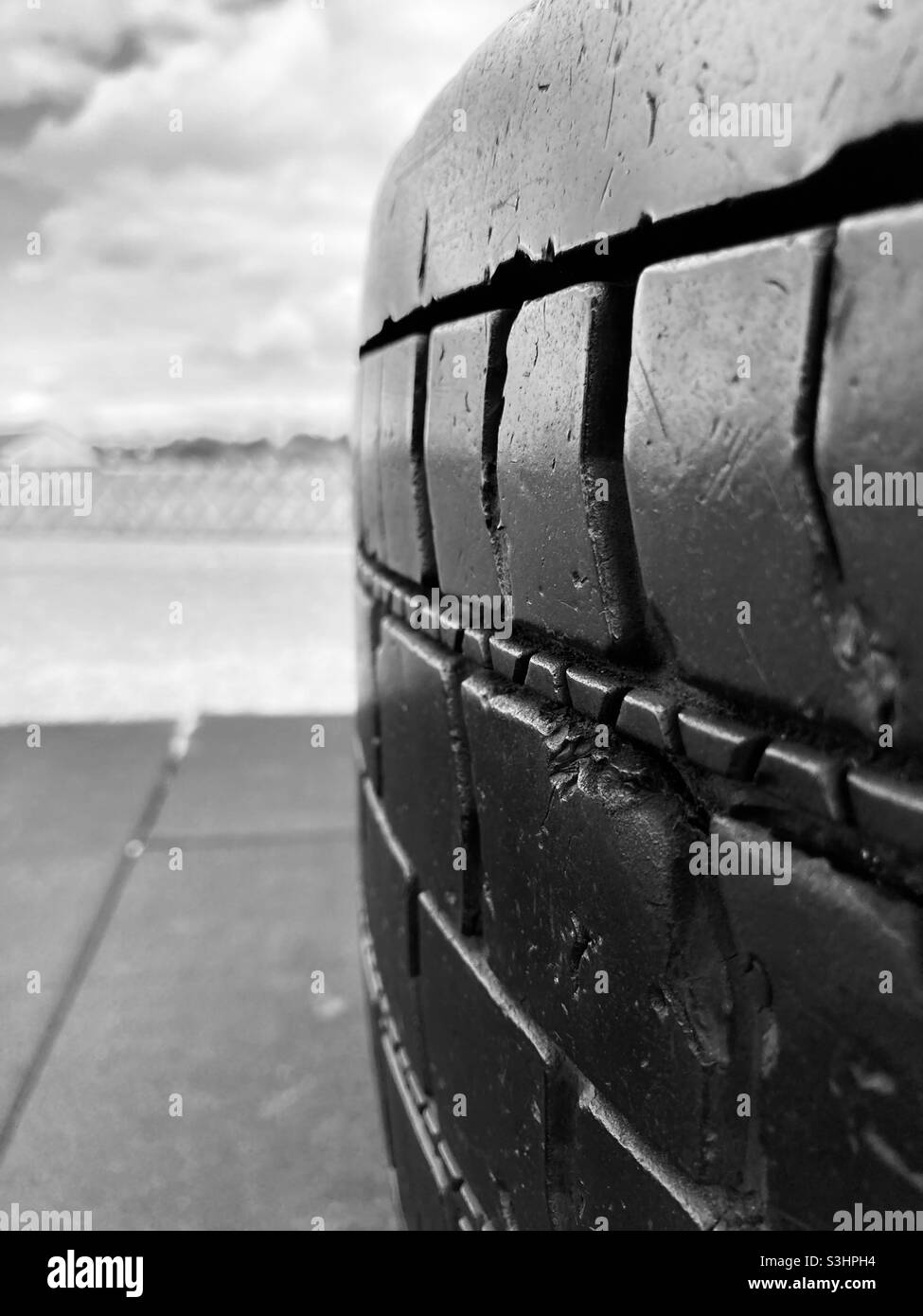 Worn tire tread closeup view Stock Photo Alamy