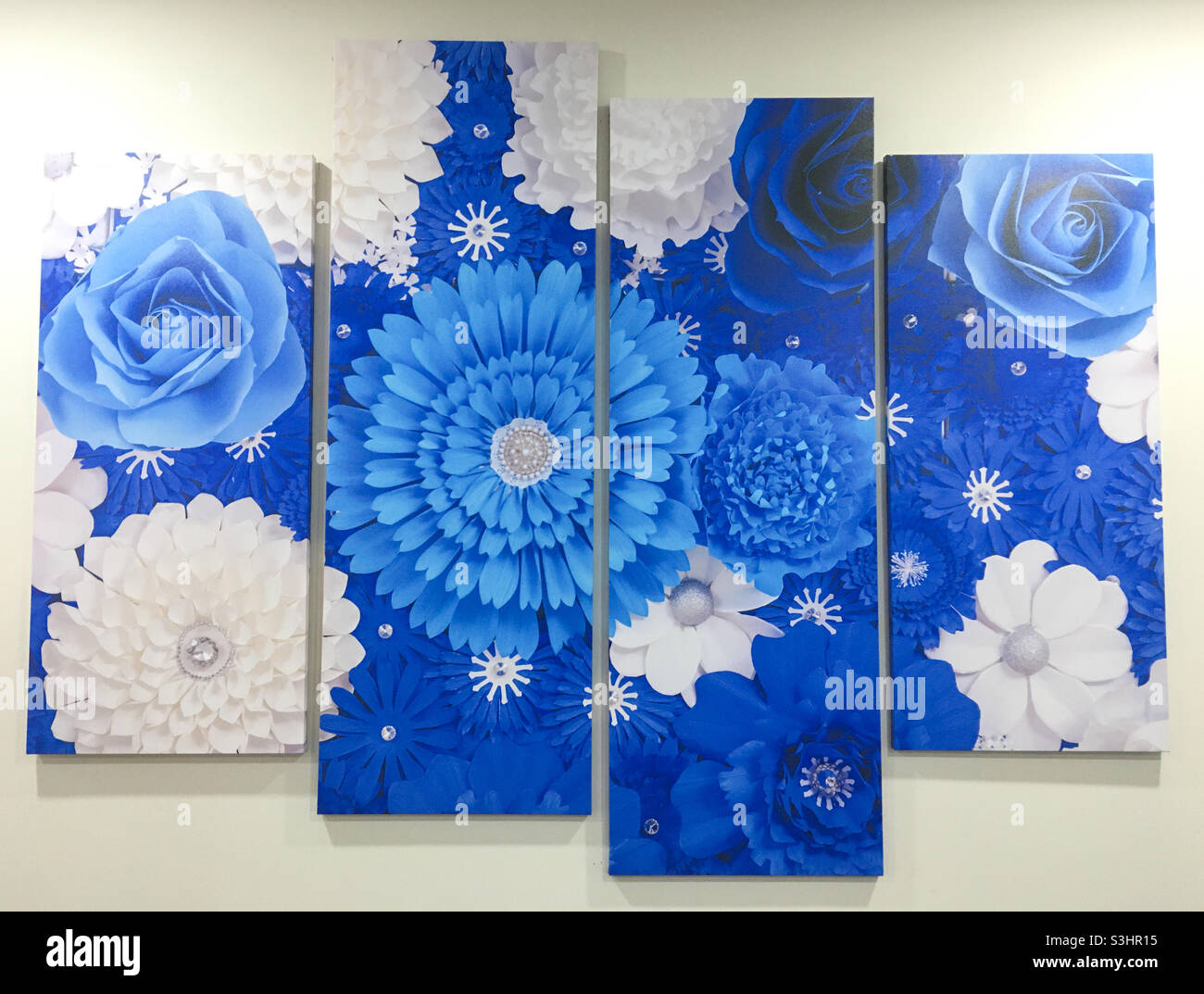 Blue and white flowers wall decorations. Stock Photo