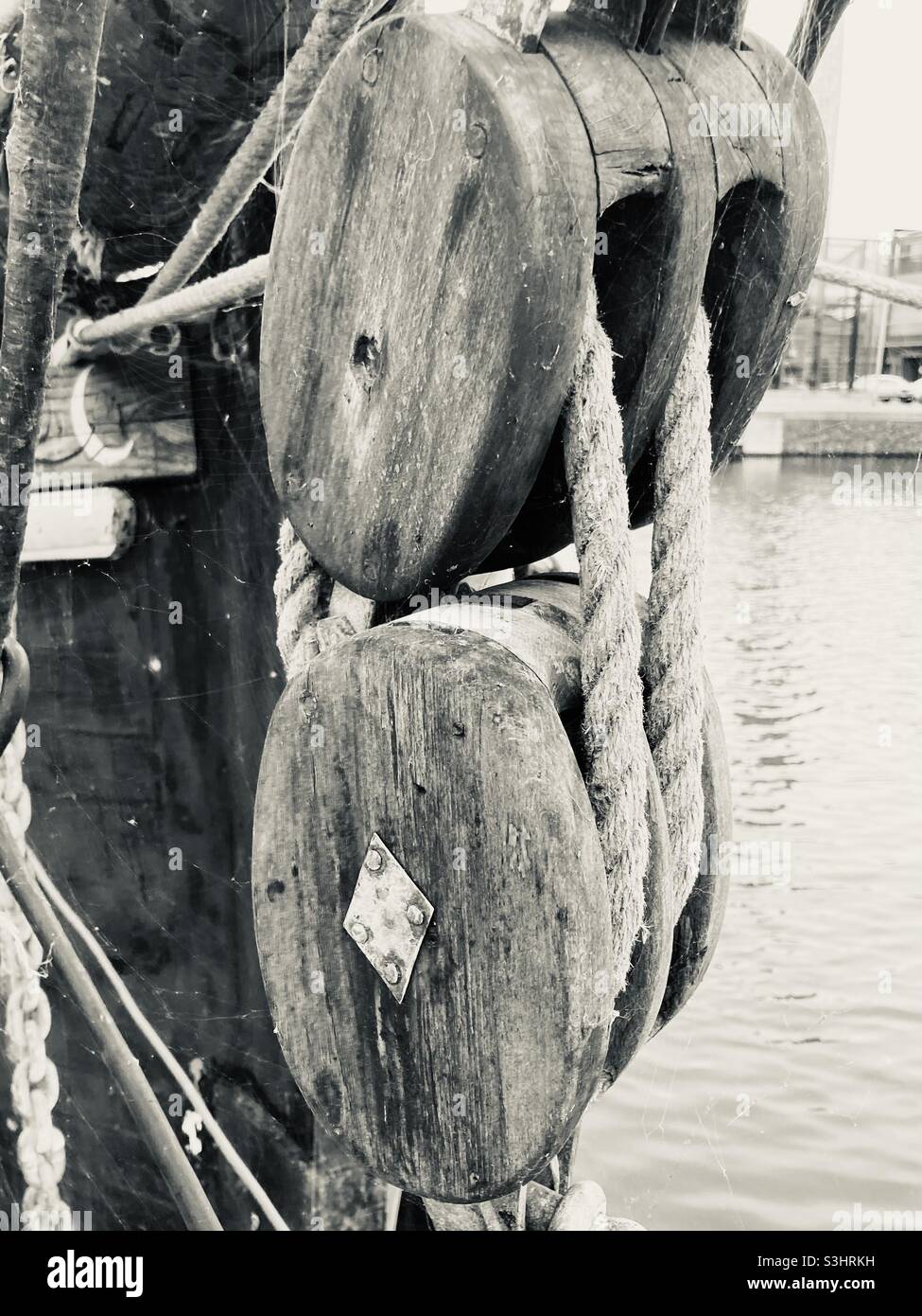 Hoist block of a ship in the port in close-up - Smartphone Captured Stock Image