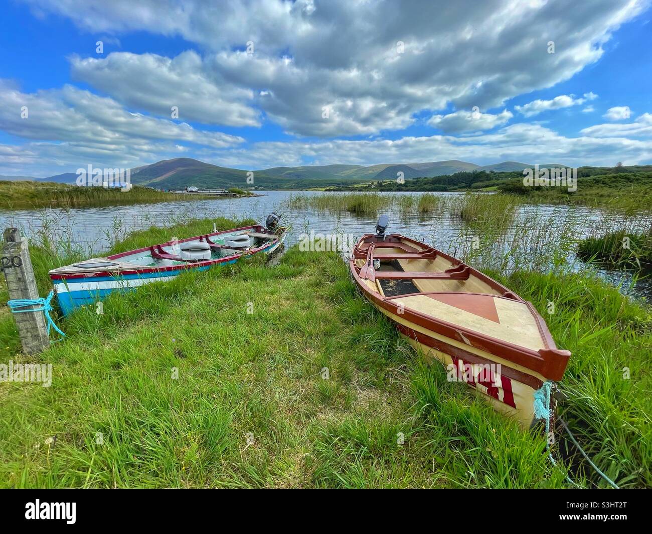Rowing boats moored at Lough Currane, Kerry, Ireland, August. - Smartphone Captured Stock Image