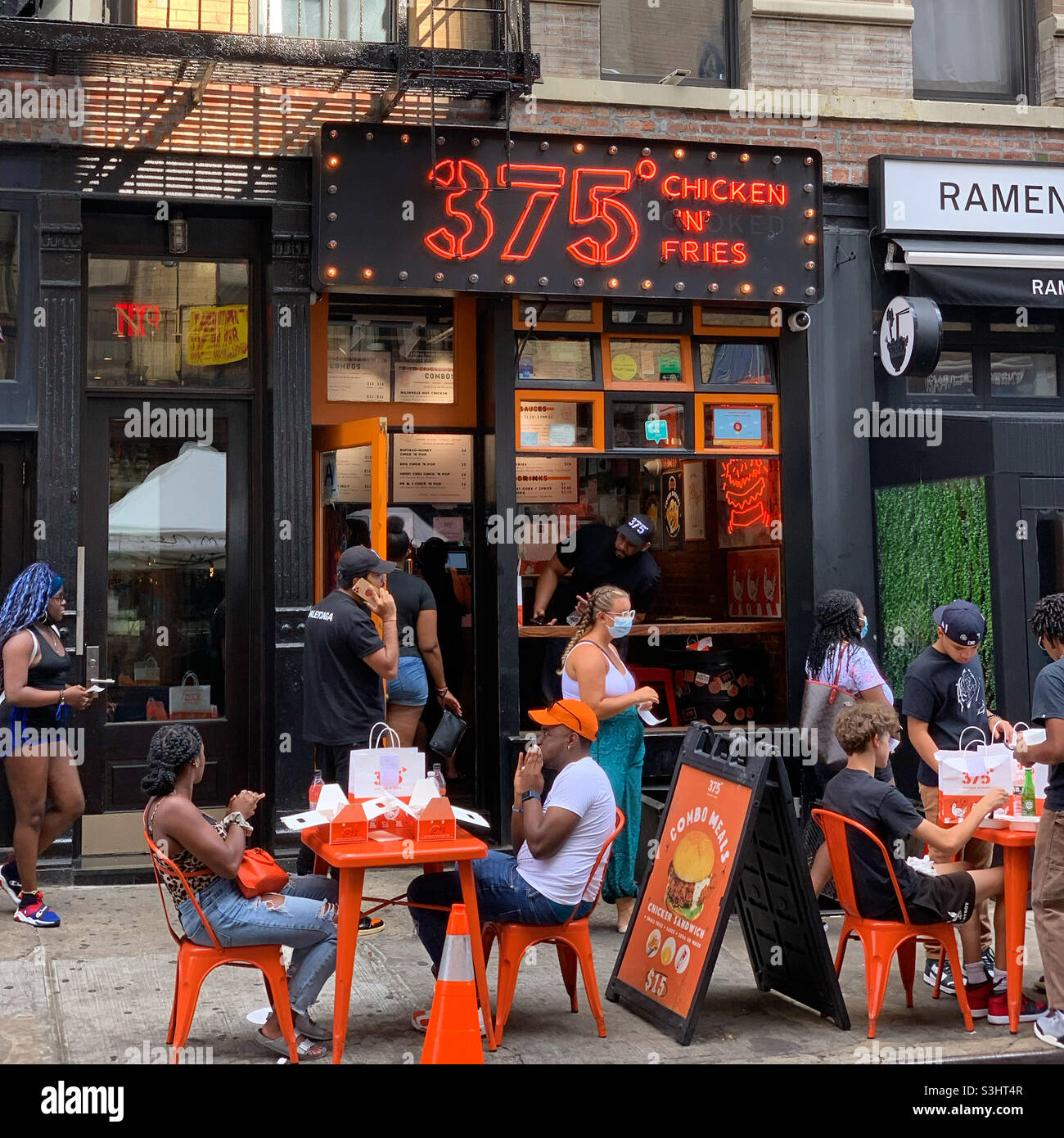 August, 2021, 375 Degrees Chicken and Fries, Lower East Side, Manhattan, New York, New York, United States - Smartphone Captured Stock Image