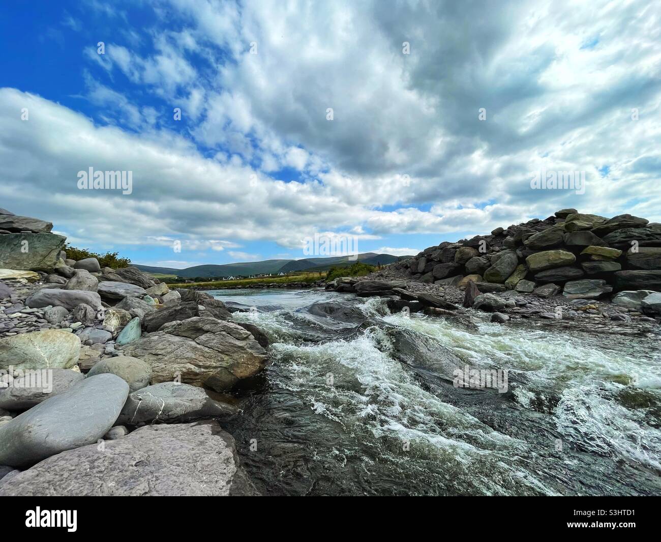 The exit of Lough Currane onto Waterville beach from the Butler pool. - Smartphone Captured Stock Image