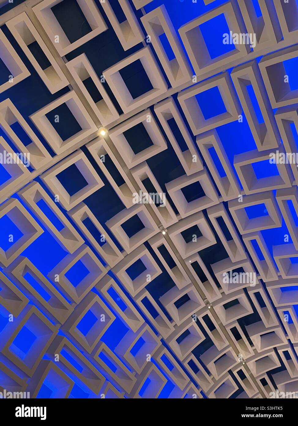 Abstract background of white box ceiling with blue background Stock ...