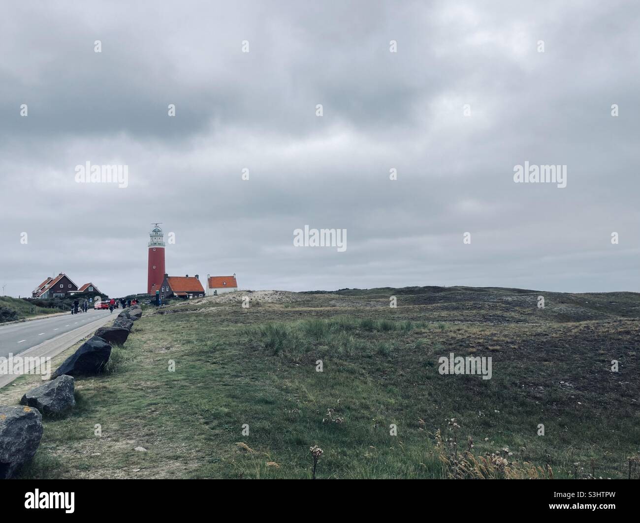 lighthouse on the island of texel in rough weather - Smartphone Captured Stock Image