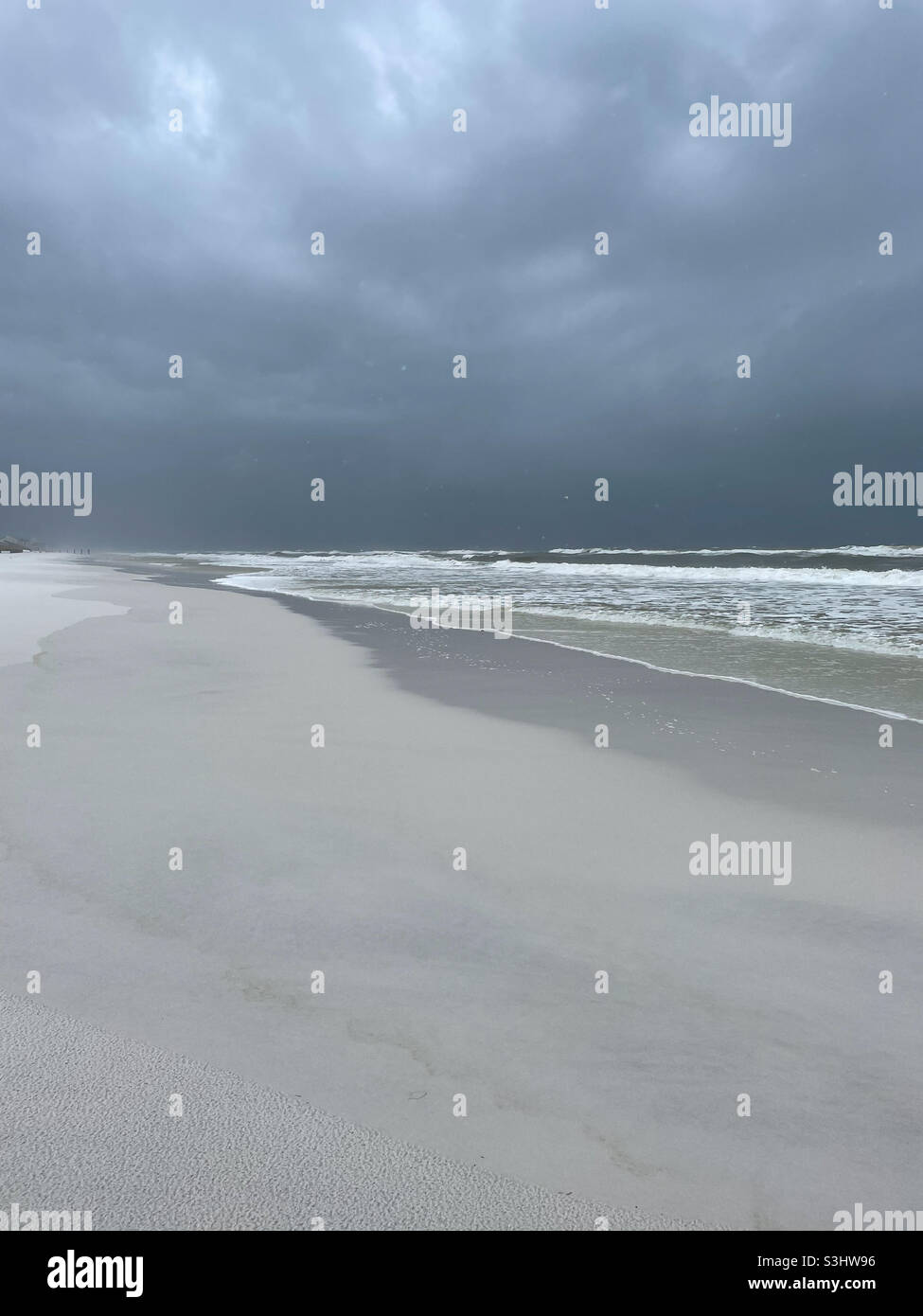 Outer band Hurricane Ida storms on Florida panhandle beach Stock Photo
