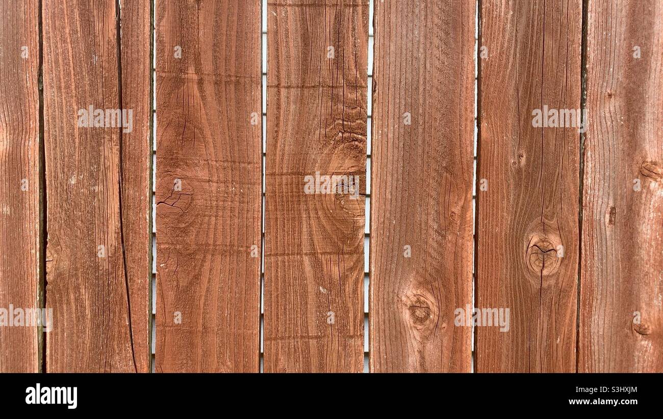 New brown wooden plank fence. Stock Photo