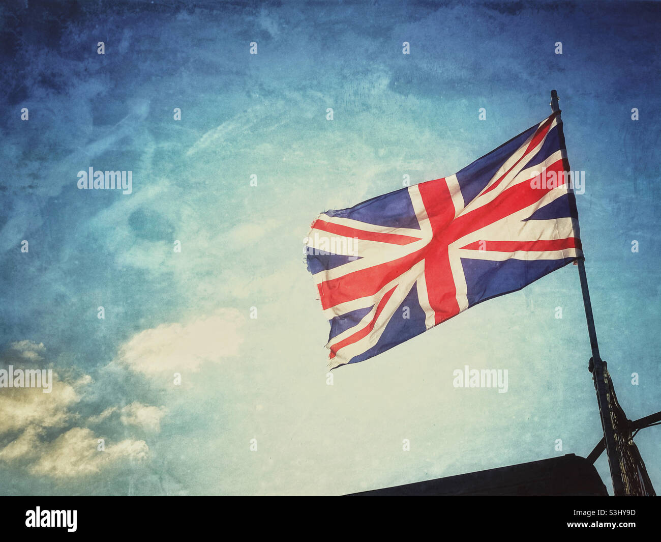 An atmospheric and dilapidated image of the British Union Jack Flag. Maybe  a visual comment on the possibility that the UK is not so important in the  world now as it once