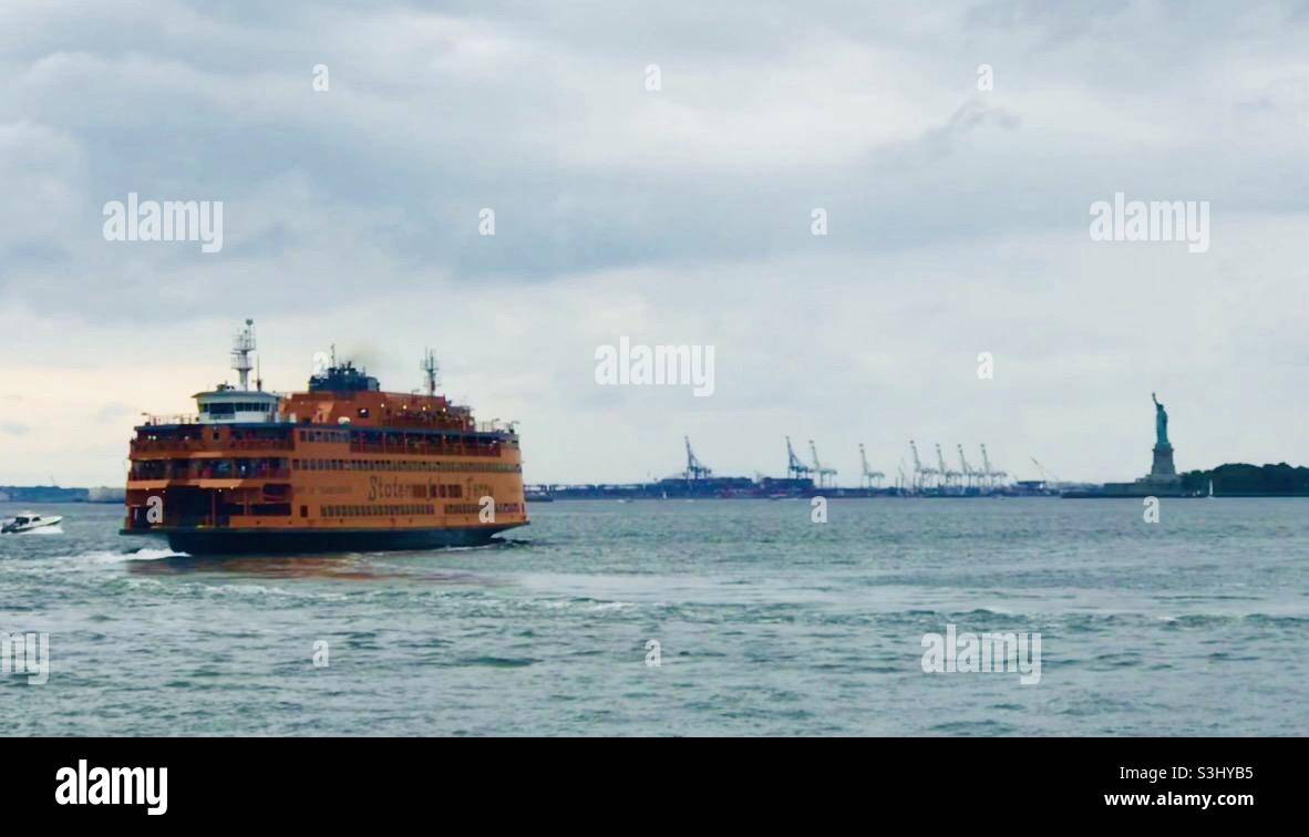 Staten Island ferry and the Statue of Liberty Stock Photo