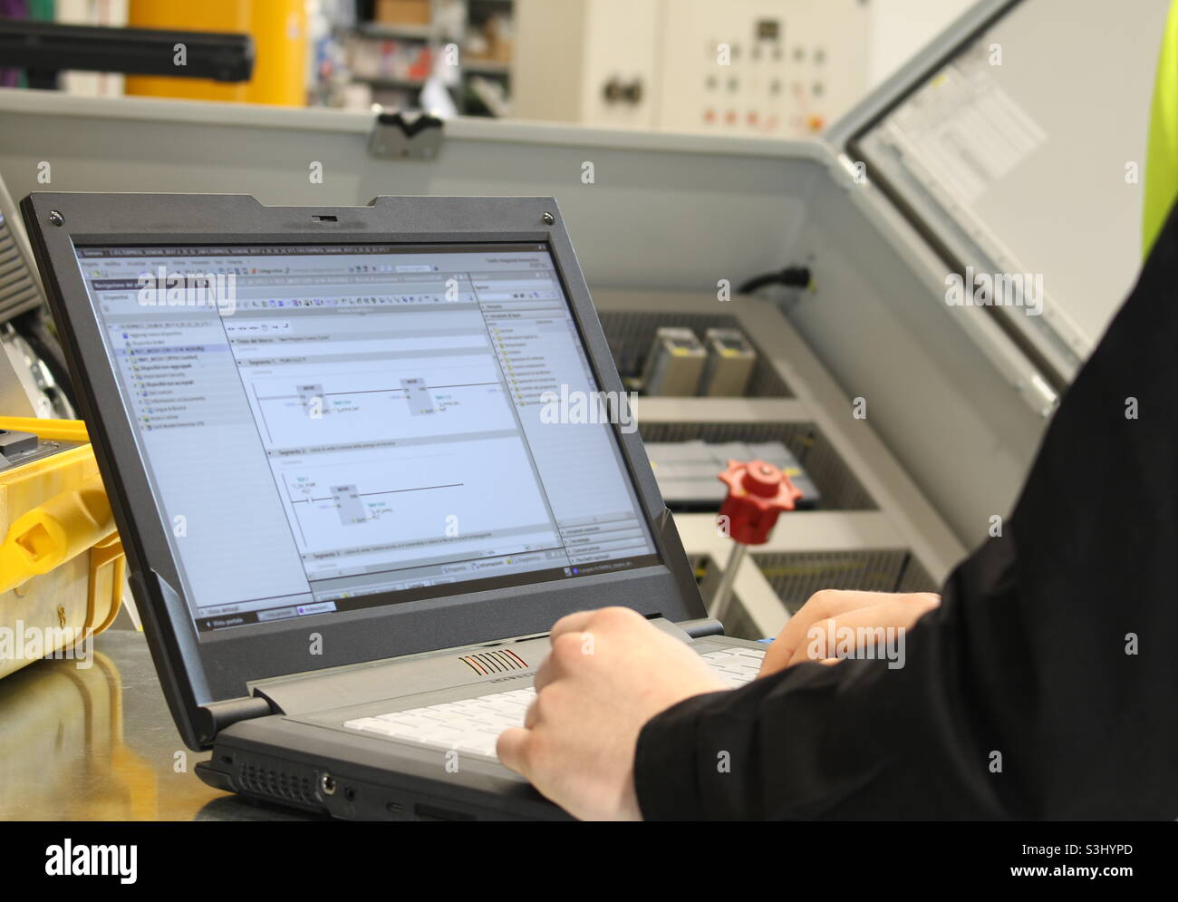 programming an electrical panel for automation control. Stock Photo