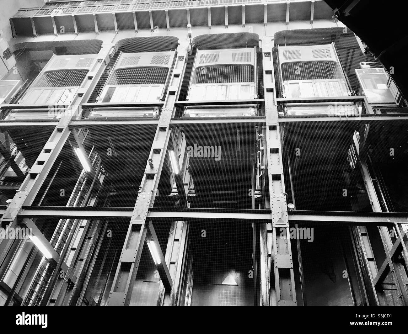 Car elevators in historic tunnel under the river Elbe in Hamburg, Germany - Smartphone Captured Stock Image
