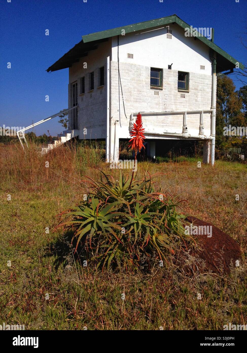 An abandoned ablution facility next to the railway line in the historic diamond mining town of Cullinan South Africa - Smartphone Captured Stock Image