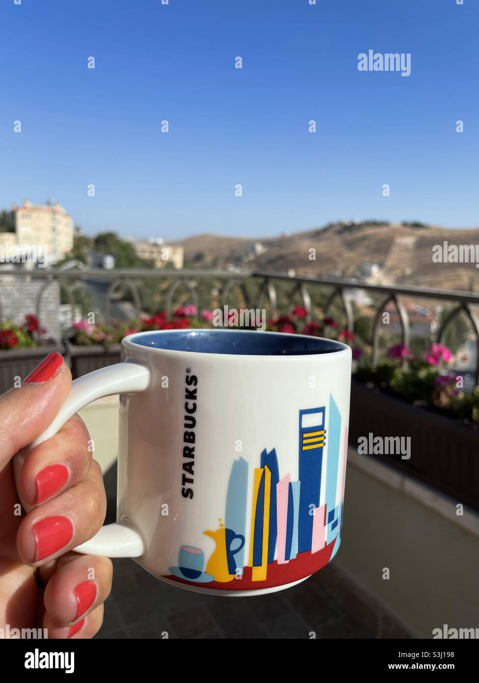 Holding starbucks cup hi-res stock photography and images - Alamy