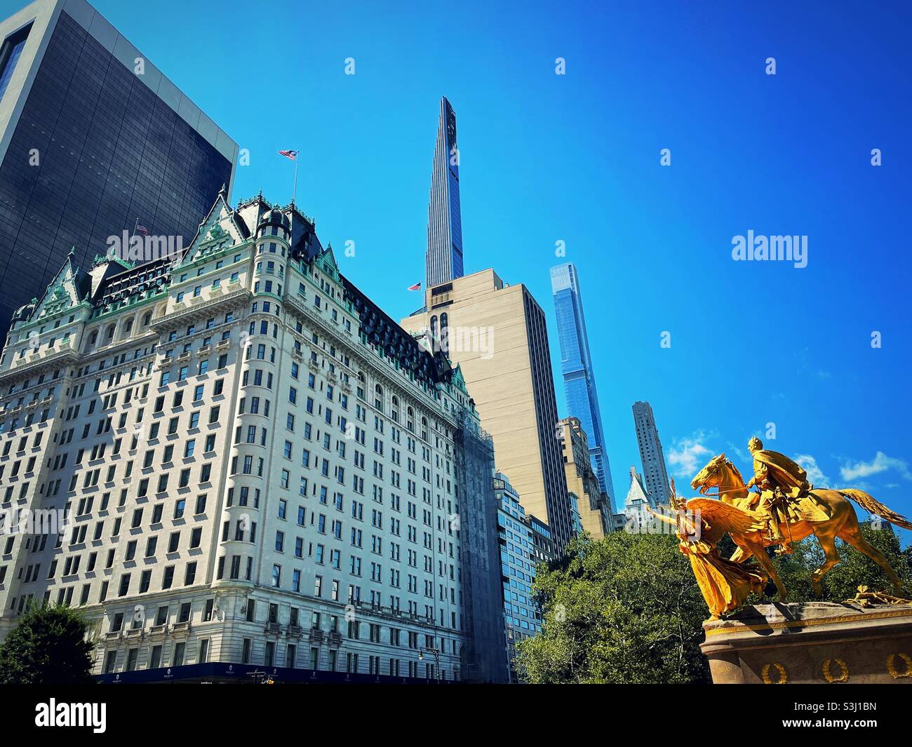The plaza hotel and the new super tall skyscrapers as seen from grand Army Plaza, 2021, NYC, USA - Smartphone Captured Stock Image