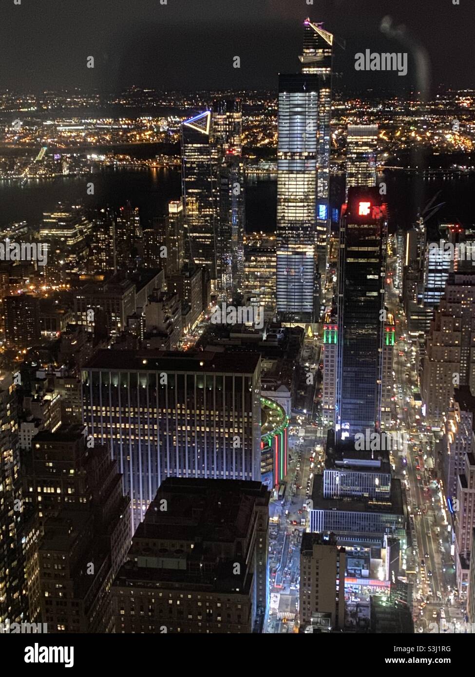 New York by night taken from the Empire State Building towards Hudson River in December 2019 - Smartphone Captured Stock Image