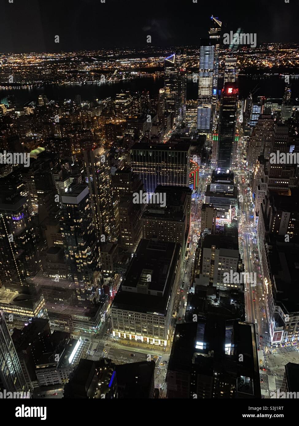 New York by night taken from the Empire State Building showing Macy’s & Madison Square Garden towards Hudson River. Taken December 2019 - Smartphone Captured Stock Image