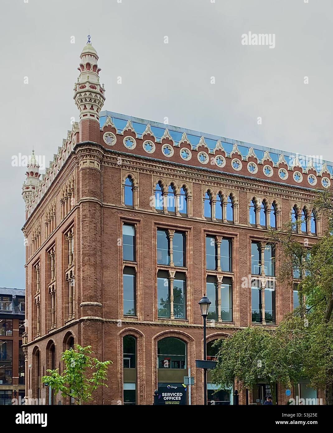 St. Paul’s House, Park Square, Leeds. Formerly a clothing warehouse of 1878, maybe based on the Alhambra (‘Hispano-Moorish’ style). Only the facade in brick and terracotta remains. Stock Photo