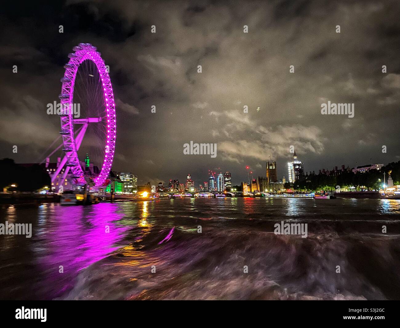 The London eye and the city skyline are seen at night in London, England on September 10 2021 Stock Photo